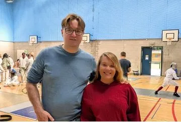 Kenny and Cari Romans Photo of Kenny and Cari at a fencing competition.